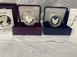 3 AMERICAN SILVER EAGLE COINS WithOGP DISPLAY CASES, OUTER BOXES AND COA S