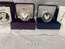 3 AMERICAN SILVER EAGLE COINS WithOGP DISPLAY CASES, OUTER BOXES AND COA S