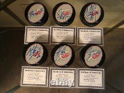 30 Autographed COA Hockey Puck With Display Case Ilitch-Yzerman 75th Anniversary