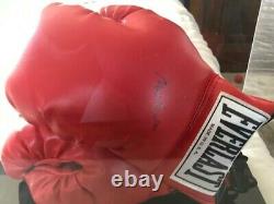 Muhammad Ali Signed Glove withCOA in display case very clean. Fan Must Have