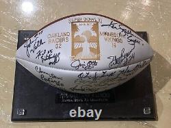 OAKLAND RAIDERS SUPER BOWL XI TEAM SIGNED FOOTBALL with DISPLAY CASE AND COAs