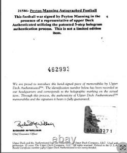 Peyton Manning signed football in display case with COA