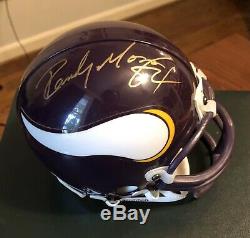 Randy Moss Autographed Mini Helmet, COA, and Display Case. #84 Inscription
