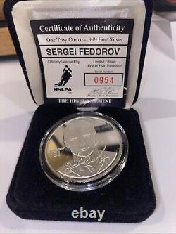 Sergei Fedorov Signed Puck & 1 Ounce Silver Coin & Display Rotating Case JSA COA