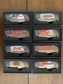 Set Of 8 Budweiser Knife collection with free display case- each with COA