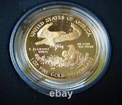 Pièce de monnaie en or U.S. 2005 de 1 once Troy avec certificat d'authenticité dans un boîtier d'affichage et une boîte d'origine.
